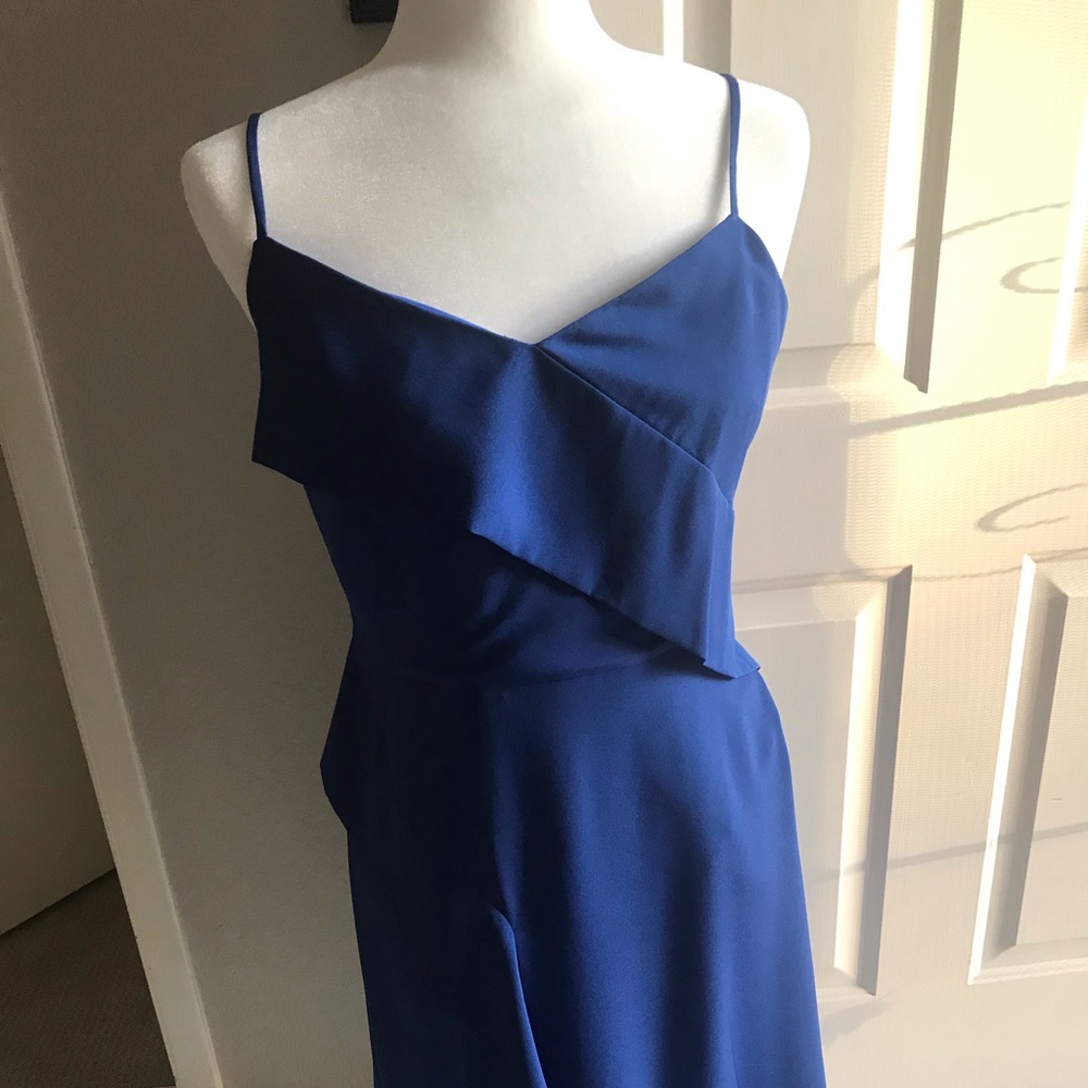 Blue asymmetrical midi dress.